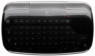 Illustration for article titled Logitech DiNovo Mini Wireless Keyboard Controls Windows Media Center and PS3